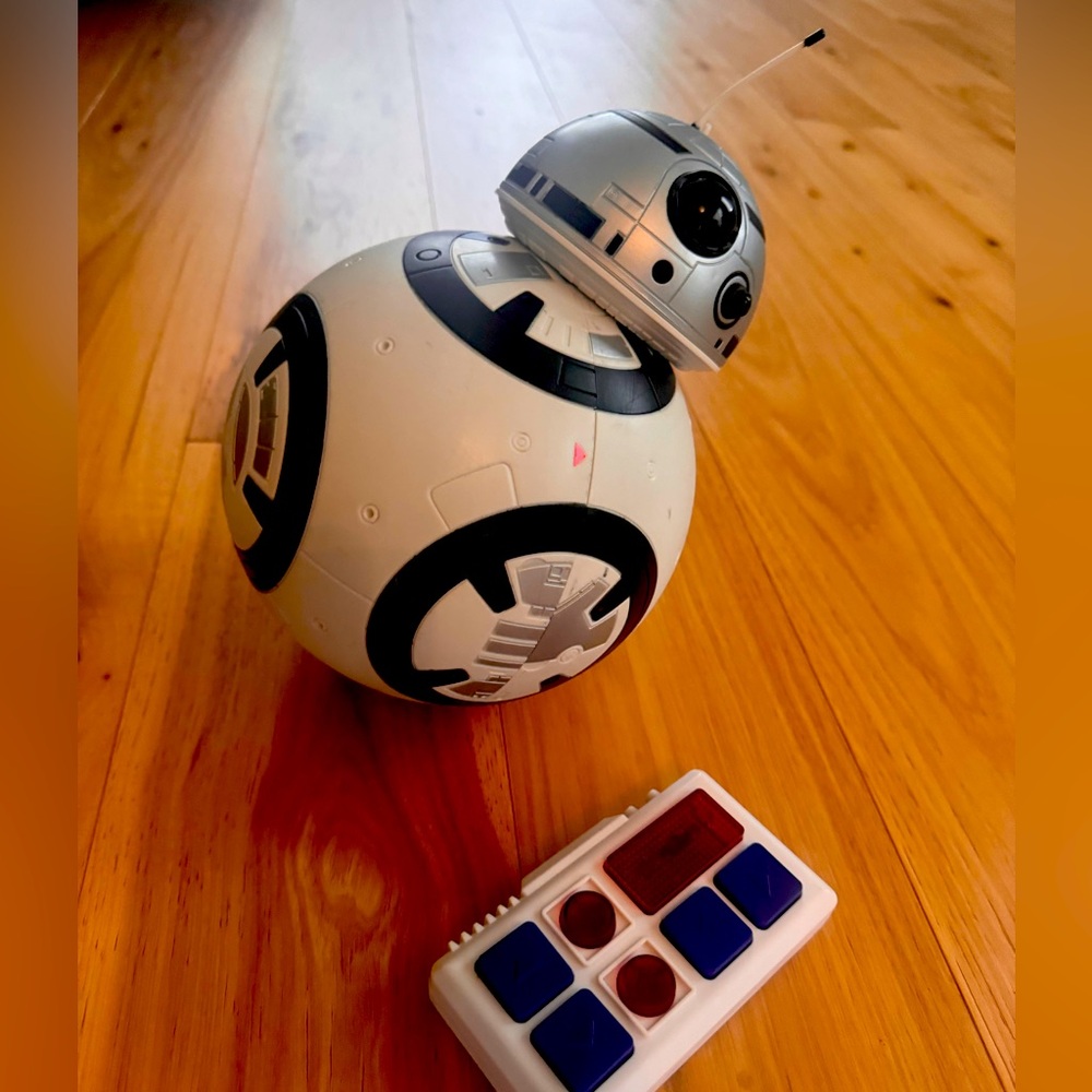 Star Wars remote control droid with collectible carrying case.
